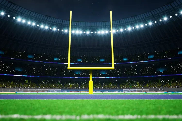 Stadium field goal posts at night